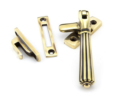 From The Anvil Aged Brass Locking Hinton Fastener from B&Q