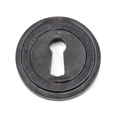 From The Anvil External Beeswax Round Escutcheon (Art Deco) from B&Q
