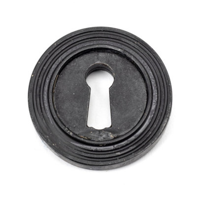 From The Anvil External Beeswax Round Escutcheon (Beehive) from B&Q