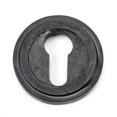 From The Anvil External Beeswax Round Euro Escutcheon (Art Deco) from B&Q