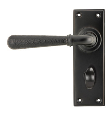 From The Anvil Aged Bronze Hammered Newbury Lever Bathroom Set from B&Q