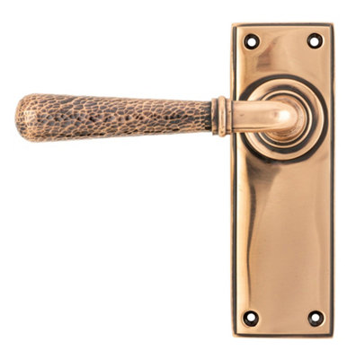 From The Anvil Polished Bronze Hammered Newbury Lever Latch Set from B&Q