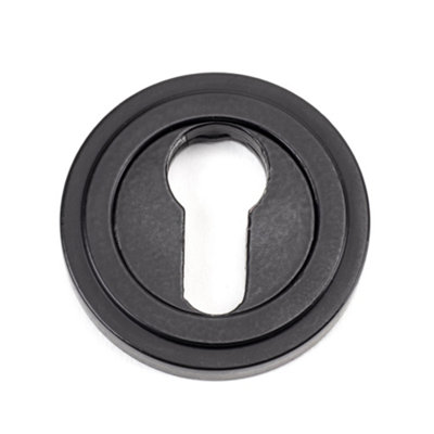 From The Anvil Matt Black Round Euro Escutcheon (Art Deco) from B&Q