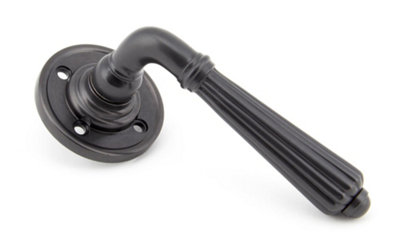 From The Anvil Aged Bronze Hinton Lever On Rose SetUnsprung from B&Q