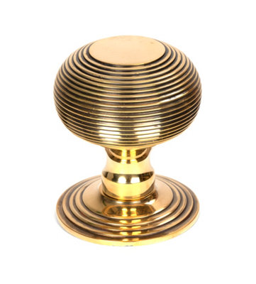 From The Anvil Aged Brass Beehive Centre Door Knob from B&Q