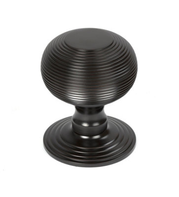 From The Anvil Aged Bronze Beehive Centre Door Knob from B&Q