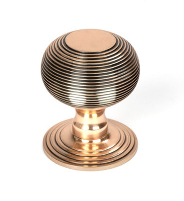 From The Anvil Polished Bronze Beehive Centre Door Knob from B&Q