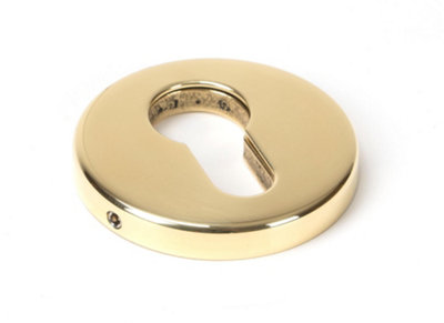 From The Anvil Polished Brass 52mm Regency Concealed Escutcheon from B&Q