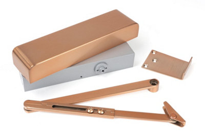 From The Anvil Polished Bronze Size 2-5 Door Closer & Cover from B&Q