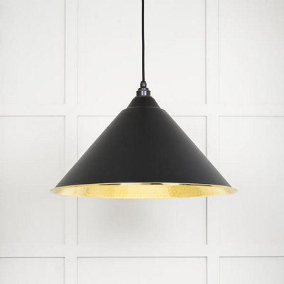 From the Anvil Hammered Brass Hockley Pendant In Elan Black from B&Q