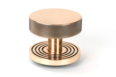 From The Anvil Polished Bronze Brompton Centre Door Knob (Beehive) from B&Q