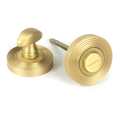 From the Anvil Satin Brass Round Thumbturn Set (Beehive) from B&Q