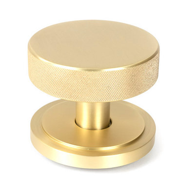 From the Anvil Satin Brass Brompton Centre Door Knob (Art Deco) from B&Q