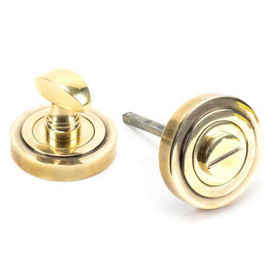 From The Anvil Aged Brass Round Thumbturn Set (Art Deco) from B&Q