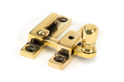 From The Anvil Aged Brass Mushroom Quadrant FastenerNarrow from B&Q