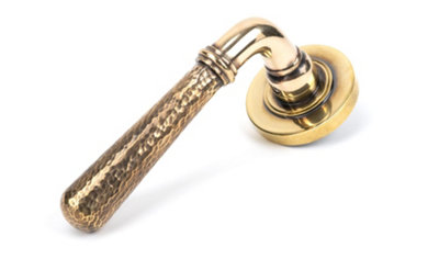From The Anvil Aged Brass Hammered Newbury Lever On Rose Set (Plain) from B&Q