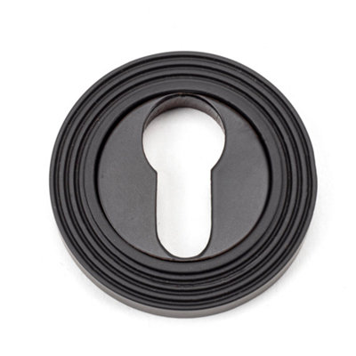 From The Anvil Aged Bronze Round Euro Escutcheon (Beehive) from B&Q