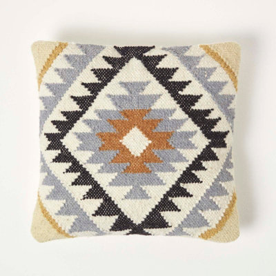Homescapes Agra Handwoven Gold And Black Kilim Cushion With Feather Filling from B&Q