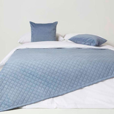 Homescapes Diamond Quilted Blue Velvet Throw from B&Q