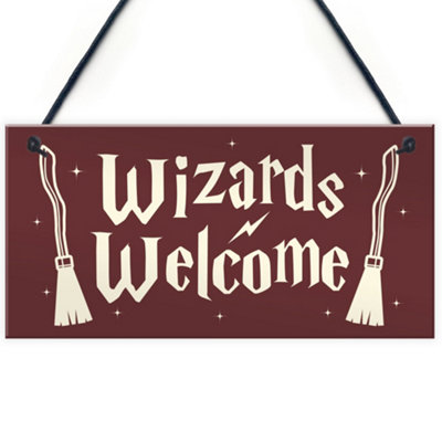 Red Ocean Wizards Welcome Novelty Hanging Sign Wizard Magic Themed Gift Son Or Daughter Christmas Gift For Brother Sister from B&Q