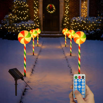 Neo Large 50Cm Candy Cane Lolly Lollipop Christmas Remote Solar And Battery Powered Lights 6 Pack Led Path Stakes Timer 8 Modes Ti from B&Q