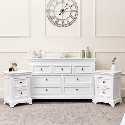 Melody Maison Large White 7 Drawer Chest Of Drawers & Pair Of Bedside TablesDaventry White Range from B&Q