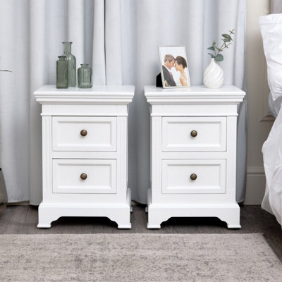 Melody Maison Pair Of White Two Drawer Bedside TablesDaventry White Range from B&Q