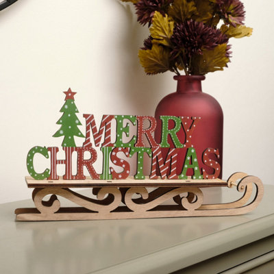 Melody Maison Rustic Wooden Green & Red Merry Christmas Sleigh Sign from B&Q