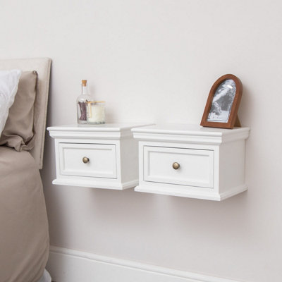 Melody Maison Pair Of White Wall Mounted Bedside TablesDaventry White Range from B&Q
