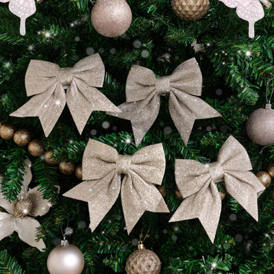 Melody Maison Set Of 4 Champagne Glitter Christmas Bows from B&Q