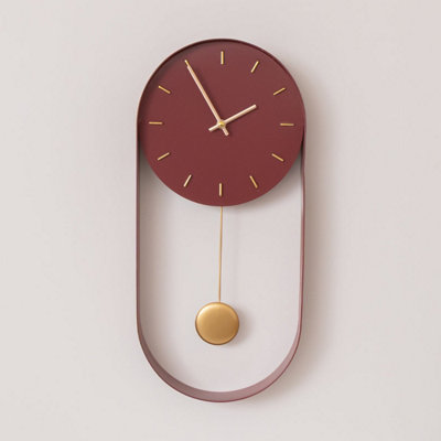 Melody Maison Raspberry Red & Gold Pendulum Metal Analogue Wall Clock20Cm X 55Cm from B&Q