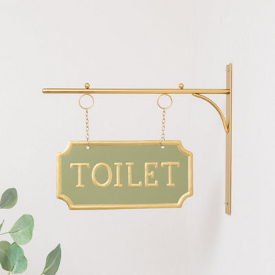 Melody Maison Gold And Sage Green Metal Wall Mounted Hanging Toilet Sign from B&Q