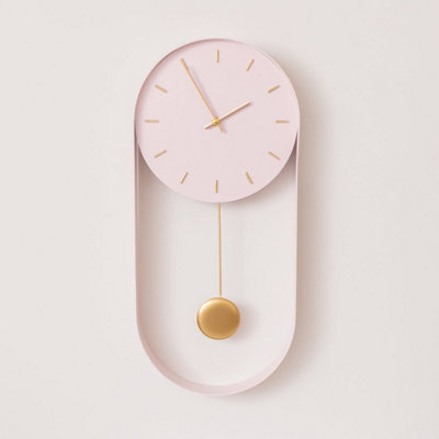 Melody Maison Pale Pink & Gold Pendulum Metal Analogue Wall Clock20Cm X 55Cm from B&Q
