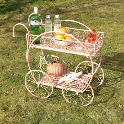Melody Maison Pink Round Garden Bar Cart Drinks Trolley Style Plant Stand from B&Q