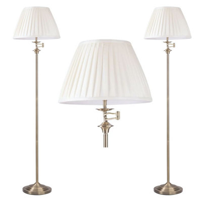 First Choice Lighting Set Of 2 Antique Brass Swing Arm Floor Lamps With White Pleated Shades from B&Q