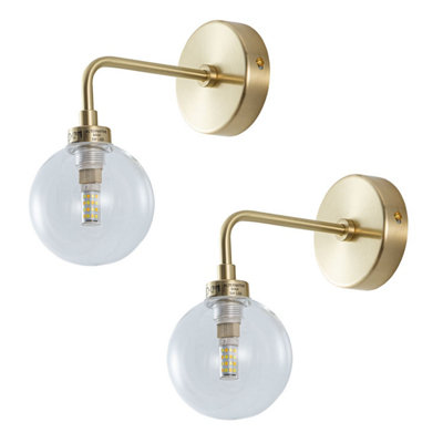 First Choice Lighting Set Of 2 Toner Satin Brass With Clear Glass Globe Wall Lights from B&Q