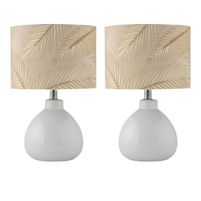 First Choice Lighting Set Of 2 Tuscan White Ceramic Lamps With Tropical Champagne Shade from B&Q