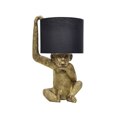 First Choice Lighting NormanBlack And Gold Monkey Table Lamp from B&Q