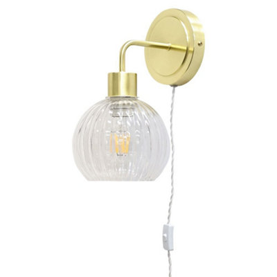 First Choice Lighting TobySatin Brass Plug In Wall Light With Betchley Clear Ribbed Shade from B&Q