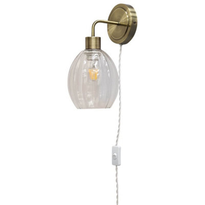 First Choice Lighting TobyAntique Brass Plug In Wall Light With Birch Fluted Glass Shade from B&Q