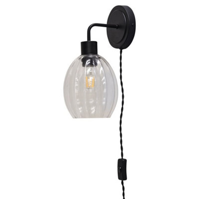 First Choice Lighting TobyBlack Plug In Wall Light With Birch Fluted Glass Shade from B&Q