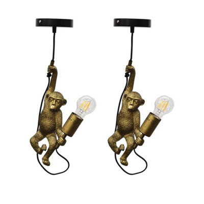 First Choice Lighting Set Of 2 NormanBlack And Gold Monkey Pendant from B&Q