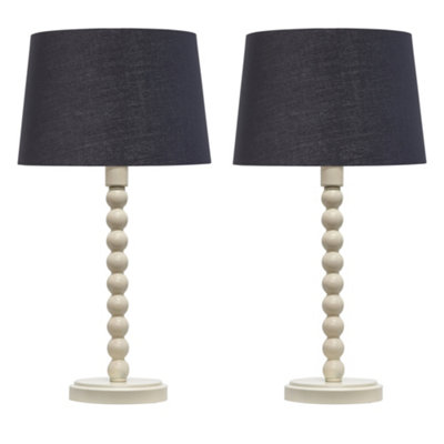 First Choice Lighting Set Of 2 BobbinIvory Lamps With Black & Gold Shades from B&Q