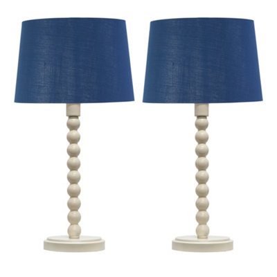 First Choice Lighting Set Of 2 BobbinIvory Lamps With Navy & Silver Shades from B&Q