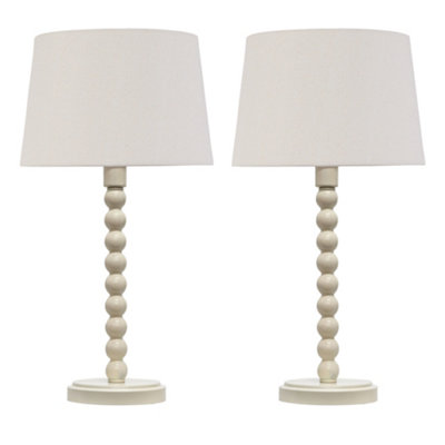First Choice Lighting Set Of 2 BobbinIvory Lamps With Natural Linen Shades from B&Q