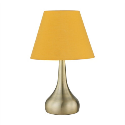 First Choice Lighting RomanaAntique Brass Touch Operated Table Lamp With Ochre Shade from B&Q