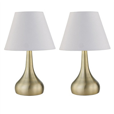First Choice Lighting Set Of 2 RomanaAntique Brass Touch Table Lamps With Ivory Shades from B&Q