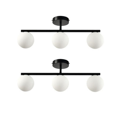 First Choice Lighting Set Of 2 Grosvenor Black 3 Light Bars With Glass Globes from B&Q