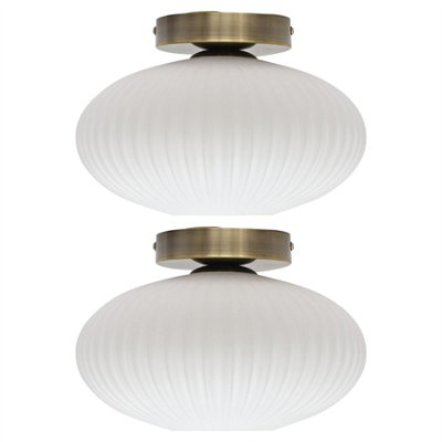 First Choice Lighting Set Of 2 BatonWhite Ribbed Oval Glass Antique Brass Ceiling Lights from B&Q