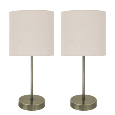 First Choice Lighting Set Of 2 Antique Brass Stick Table Lamps With Natural Linen Shades from B&Q